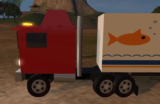 A little red cab-over truck with chrome stacks, pulling a white box trailer painted with an orange fish and waves.